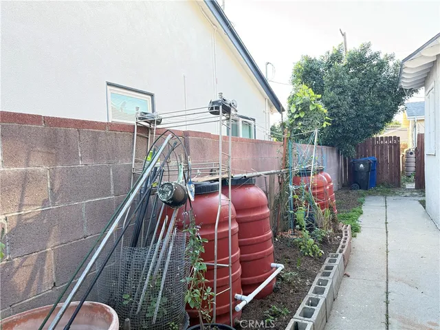 a balcony with view of outdoor space
