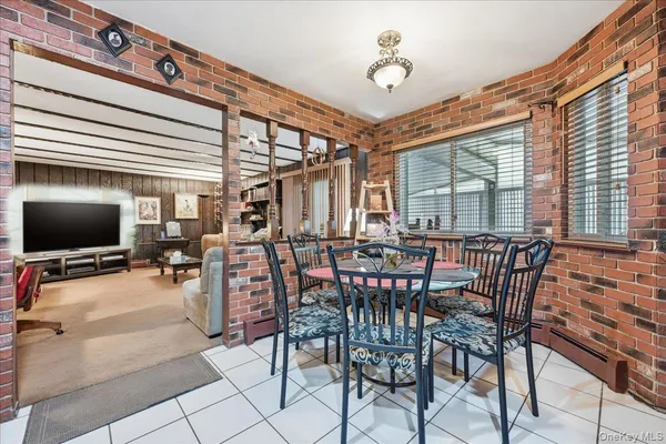 a view of a livingroom with furniture and window
