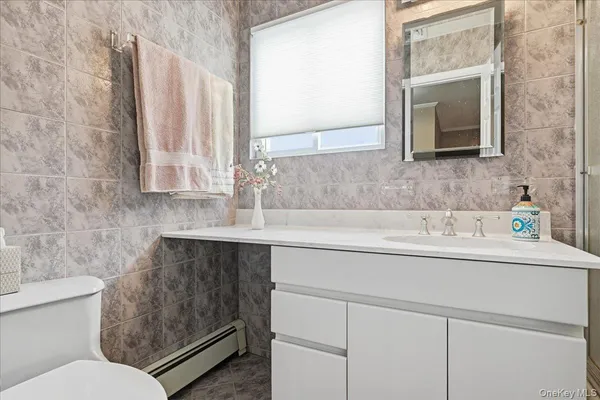 a bathroom with a sink and a toilet