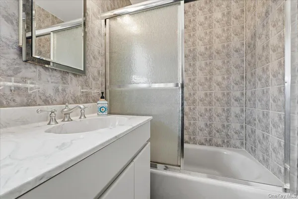 a bathroom with a sink and a bathtub