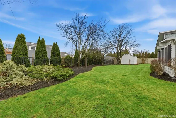 a view of a garden with trees
