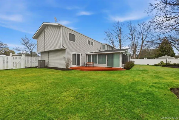 a view of a yard with a house and garden