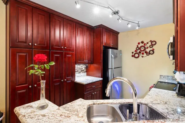 a kitchen with a stove and a microwave