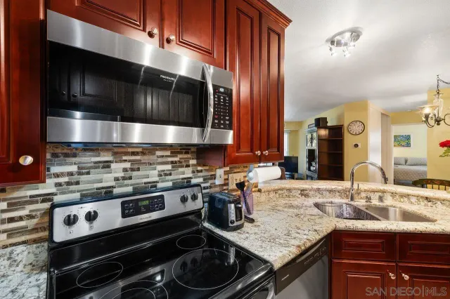 a view of kitchen island dining table and chairs