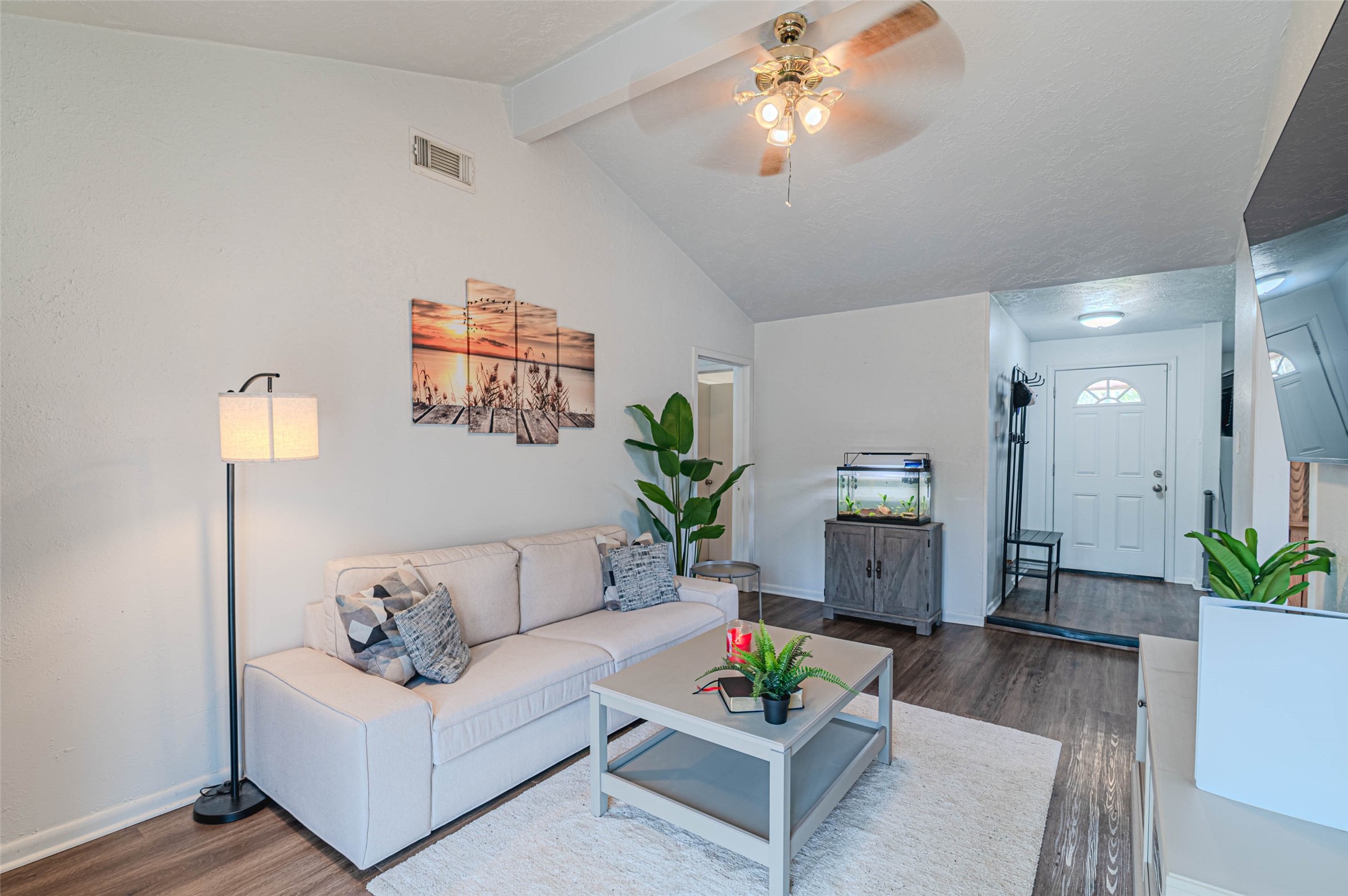 4606 Fitzwater Drive Spring, TX 77373 - Photo 13 of 42 a living room with furniture and a potted plant