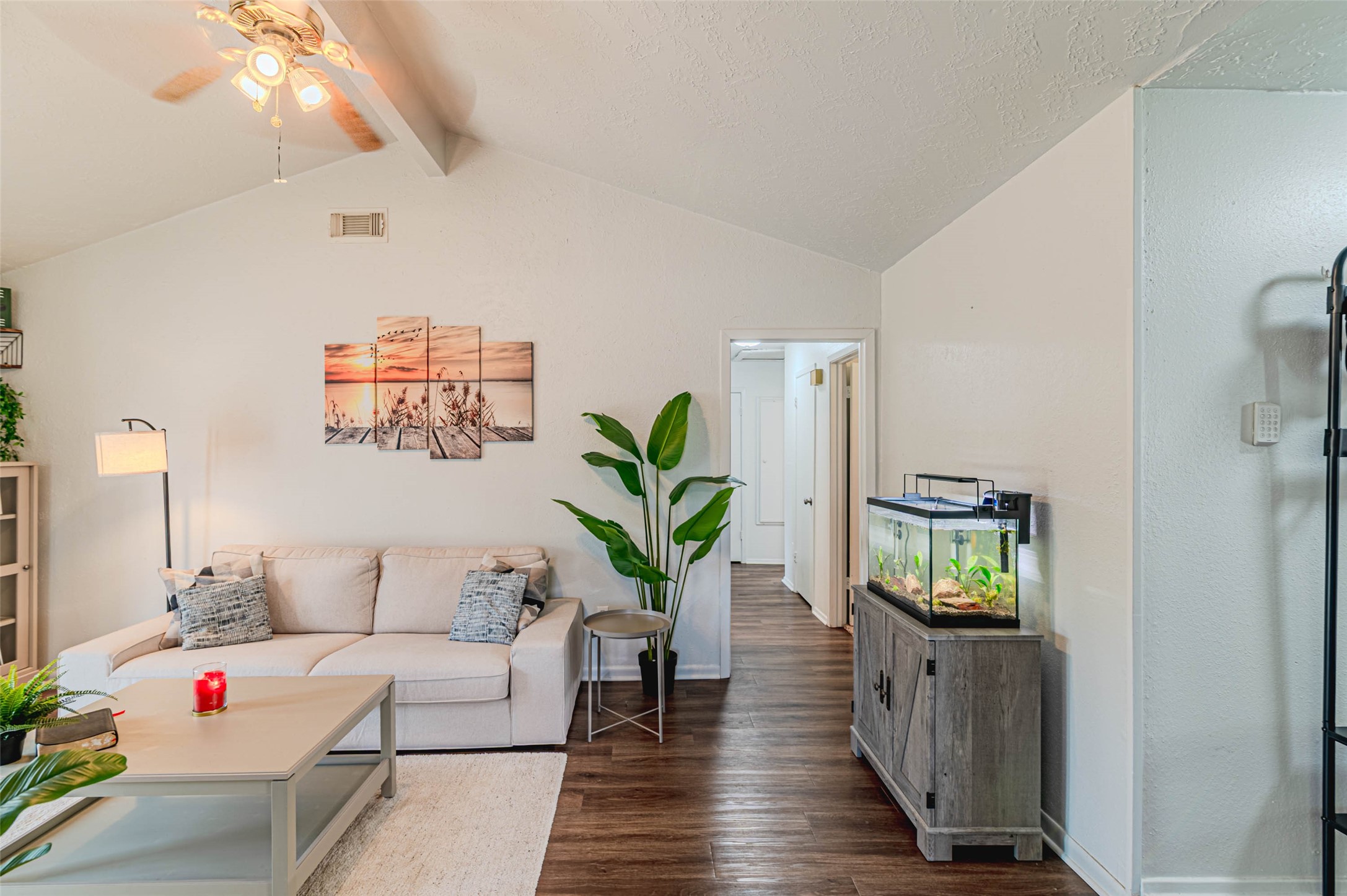 4606 Fitzwater Drive Spring, TX 77373 - Photo 10 of 42 a living room with furniture a chandelier and wooden floor