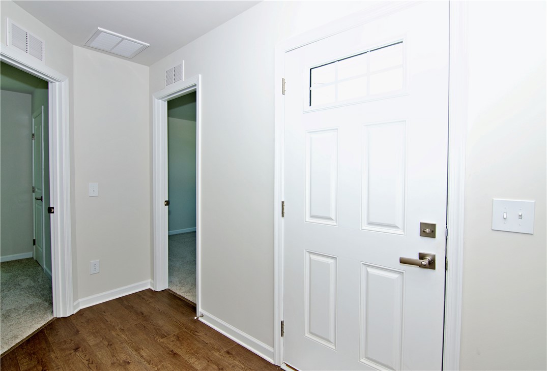 723 Peridot Way Westminster, SC 29693 - Photo 5 of 45 A welcoming entryway with resilient wood flooring and clean, bright white doors throughout.