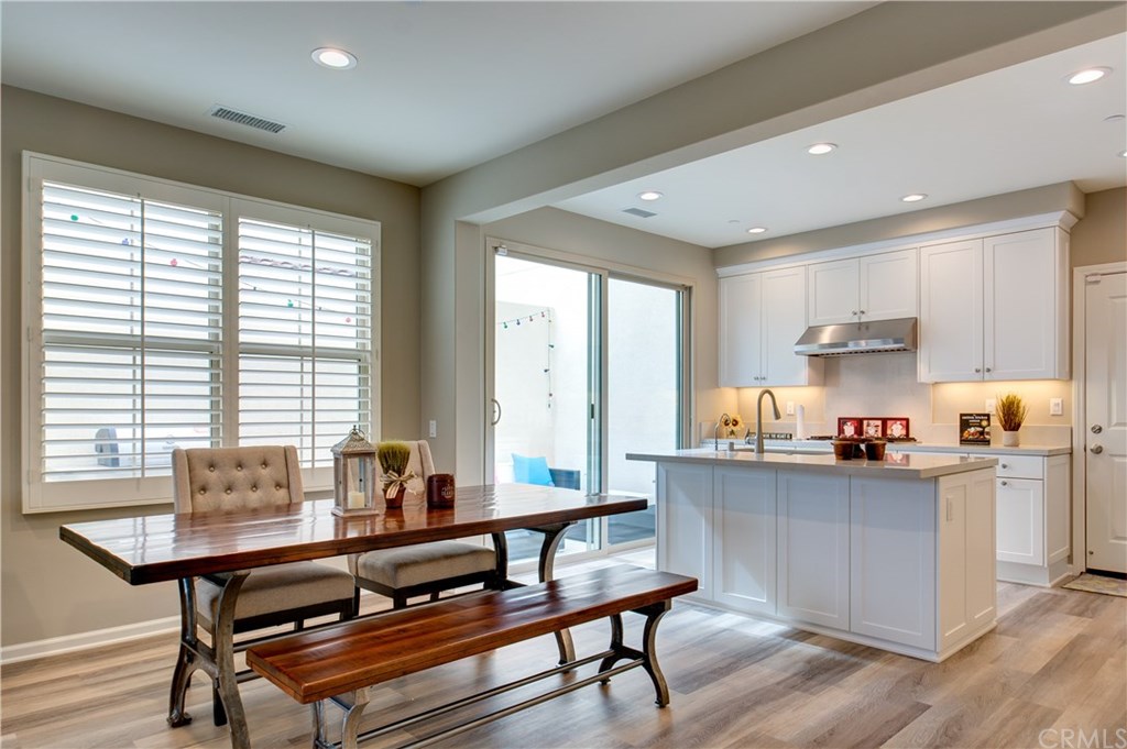 168 Outwest Irvine, CA 92618 - Photo 11 of 36 a living room with furniture and a window
