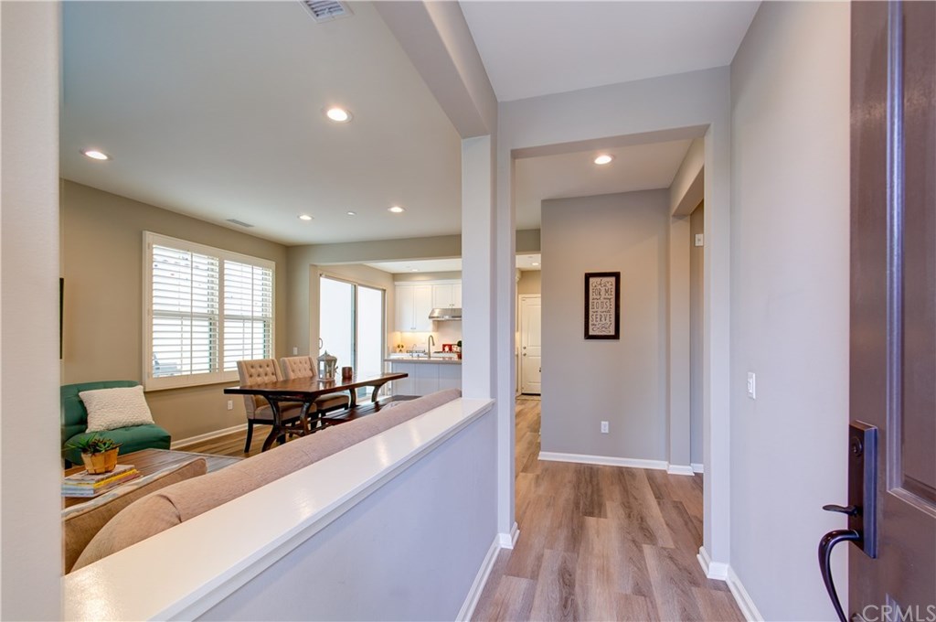 168 Outwest Irvine, CA 92618 - Photo 4 of 36 a large living room with stainless steel appliances granite countertop furniture and a large window