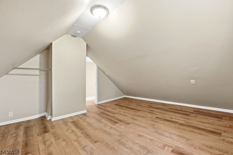 164 South Ridgewood Road South Orange, NJ 07079 - Photo 16 of 20 a view of an empty room with wooden floor