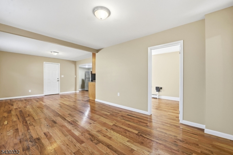 164 South Ridgewood Road South Orange, NJ 07079 - Photo 2 of 20 a view of empty room with wooden floor
