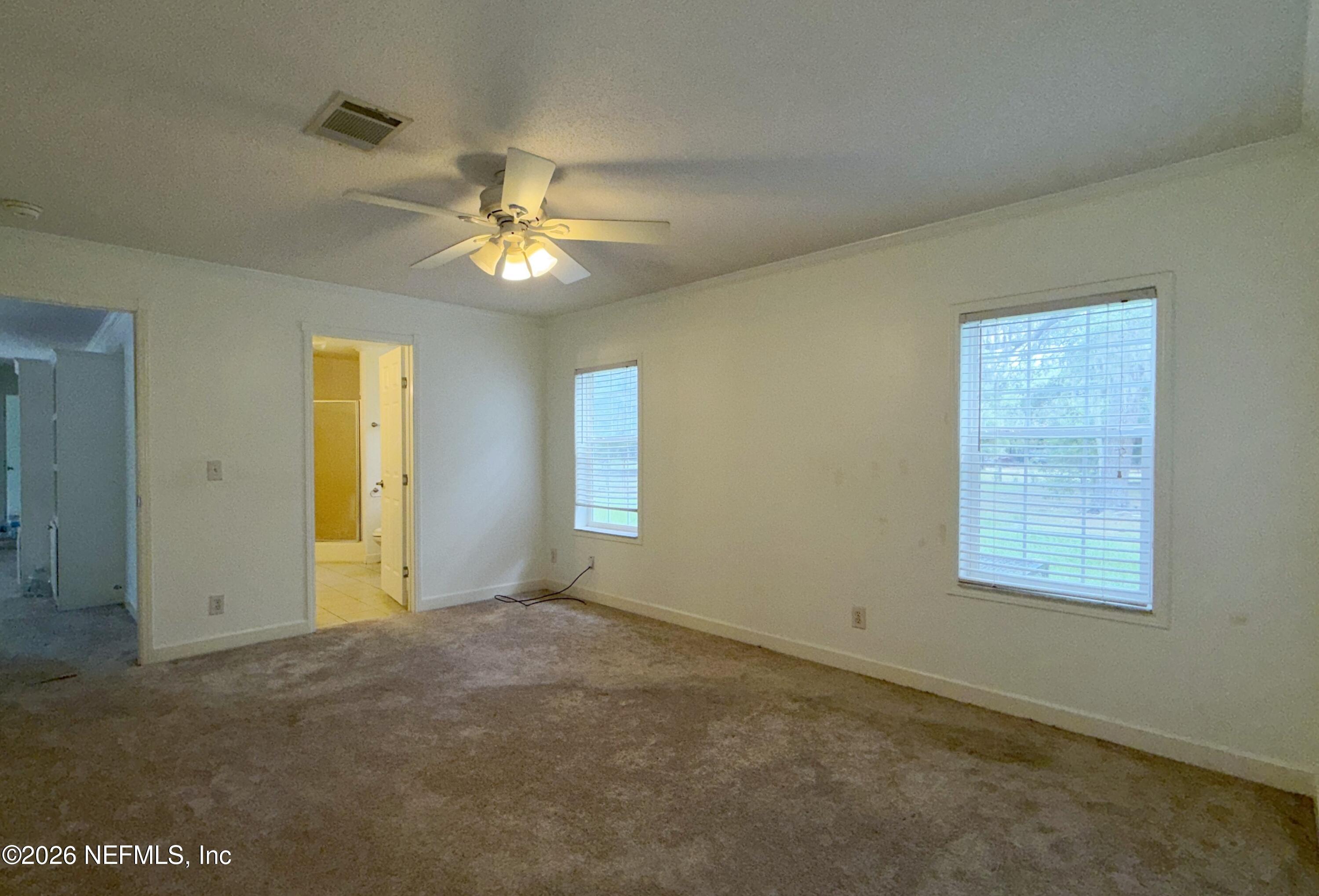 136 Short Pine Road Hawthorne, FL 32640 - Photo 17 of 39 a view of an empty room with a window