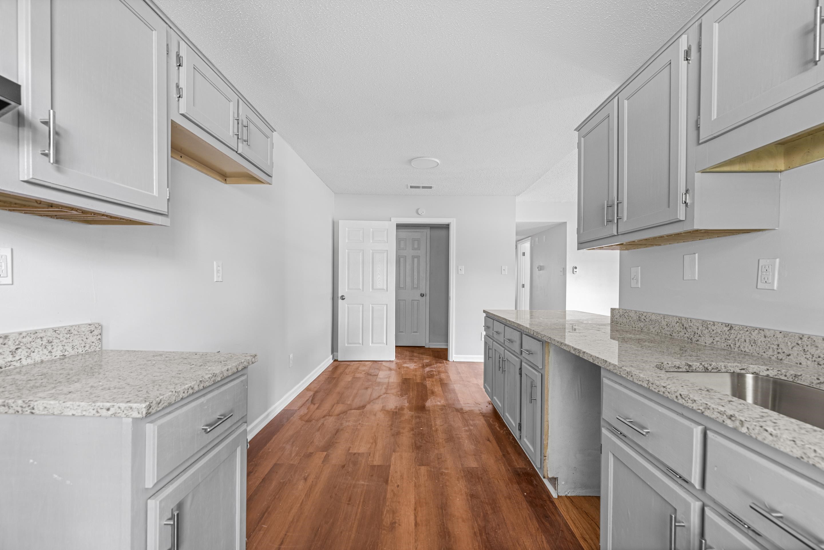 3879 Windermere Road Memphis, TN 38128 - Photo 11 of 20 a kitchen with a sink and cabinets