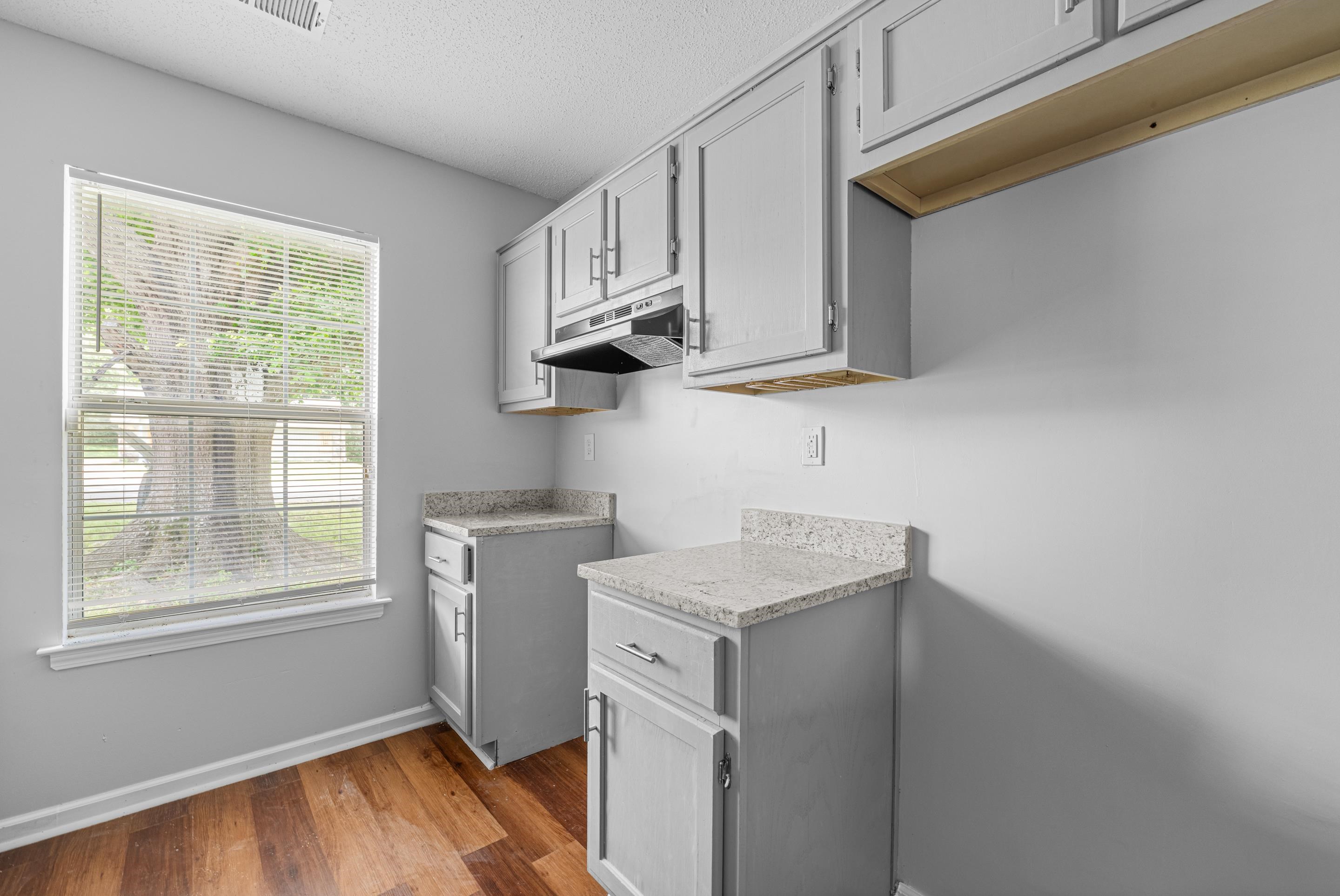 3879 Windermere Road Memphis, TN 38128 - Photo 5 of 20 a room with storage and utility