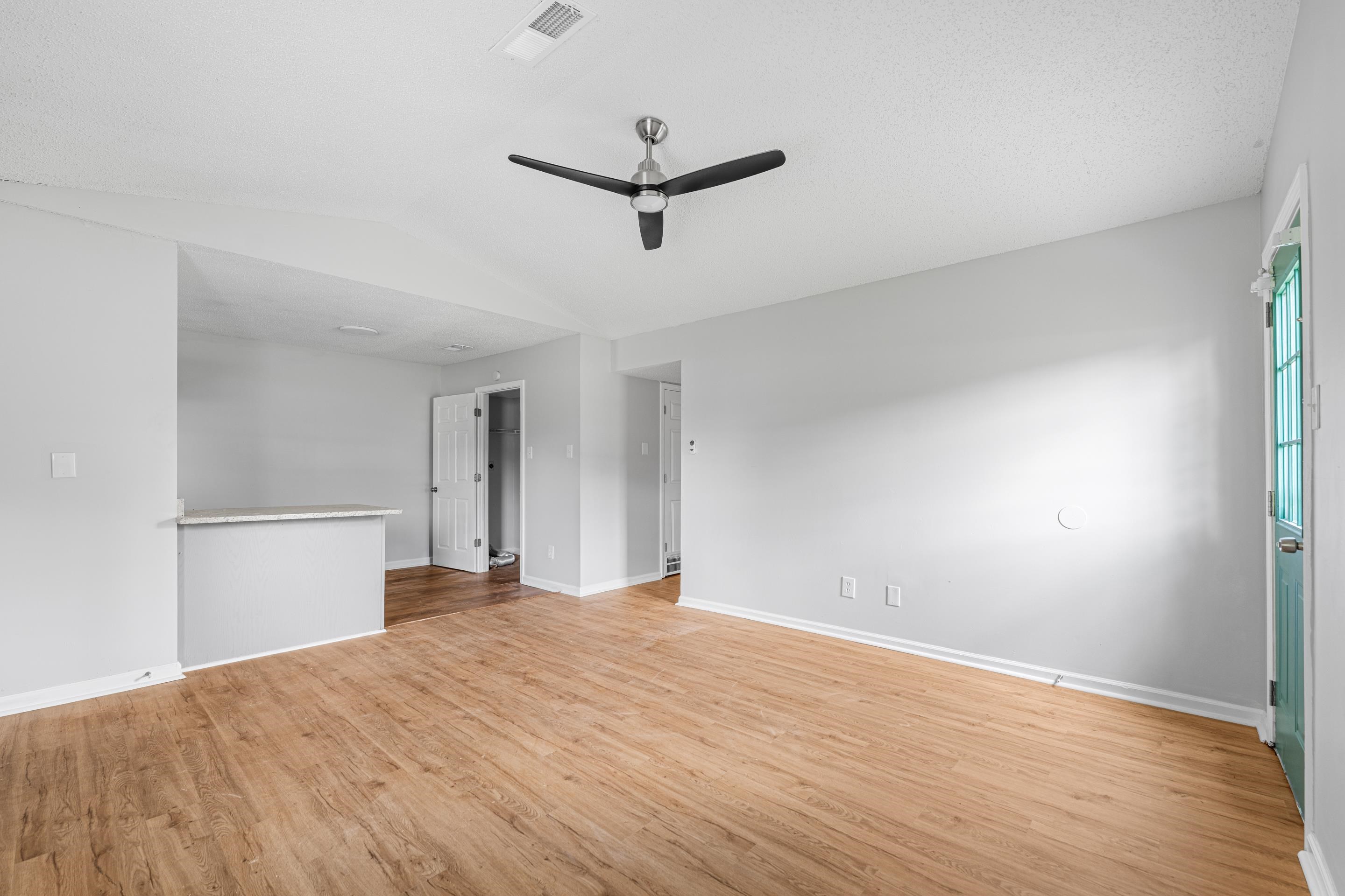3879 Windermere Road Memphis, TN 38128 - Photo 9 of 20 a bedroom with a bed and a ceiling fan