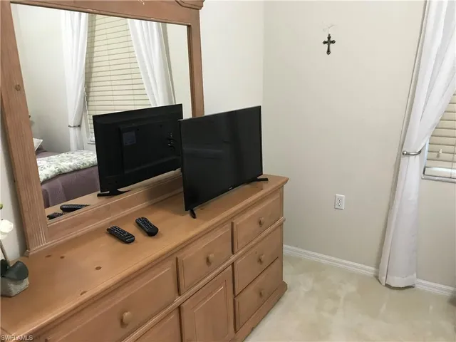 a view of cabinets with wooden floor