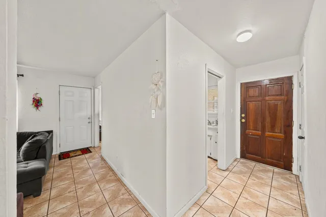 a view of hallway with walk in closet