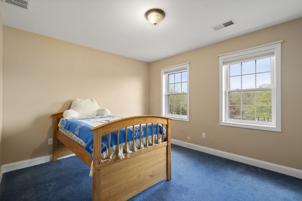 161 Bear Hole Road West Springfield, MA 01089 - Photo 24 of 35 a small bedroom with a bed and window