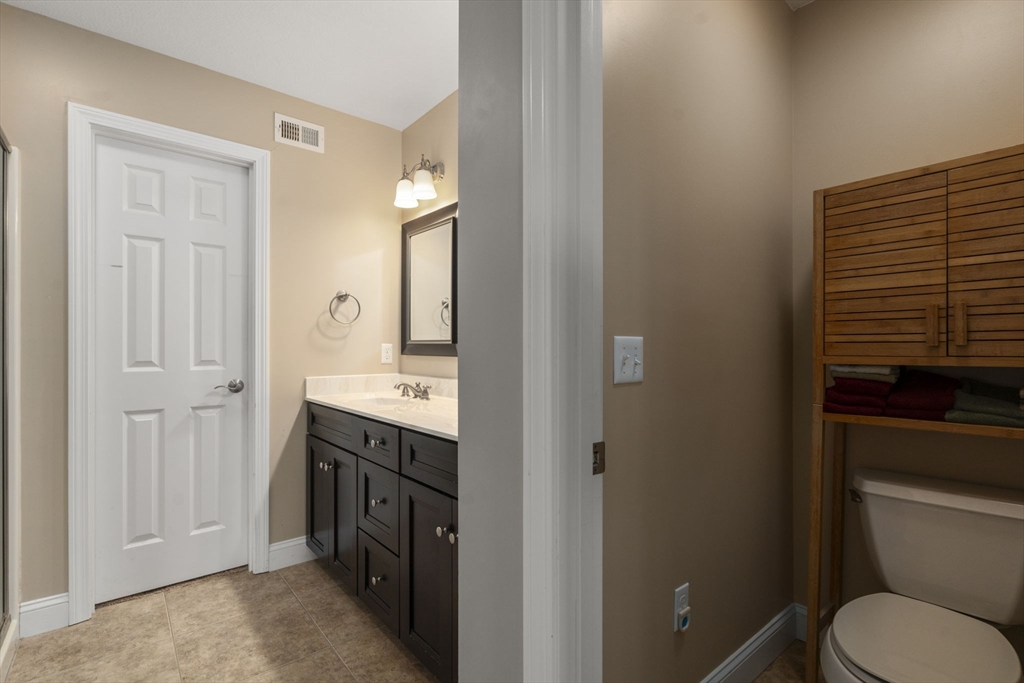 161 Bear Hole Road West Springfield, MA 01089 - Photo 29 of 35 a bathroom with a sink a toilet and shower