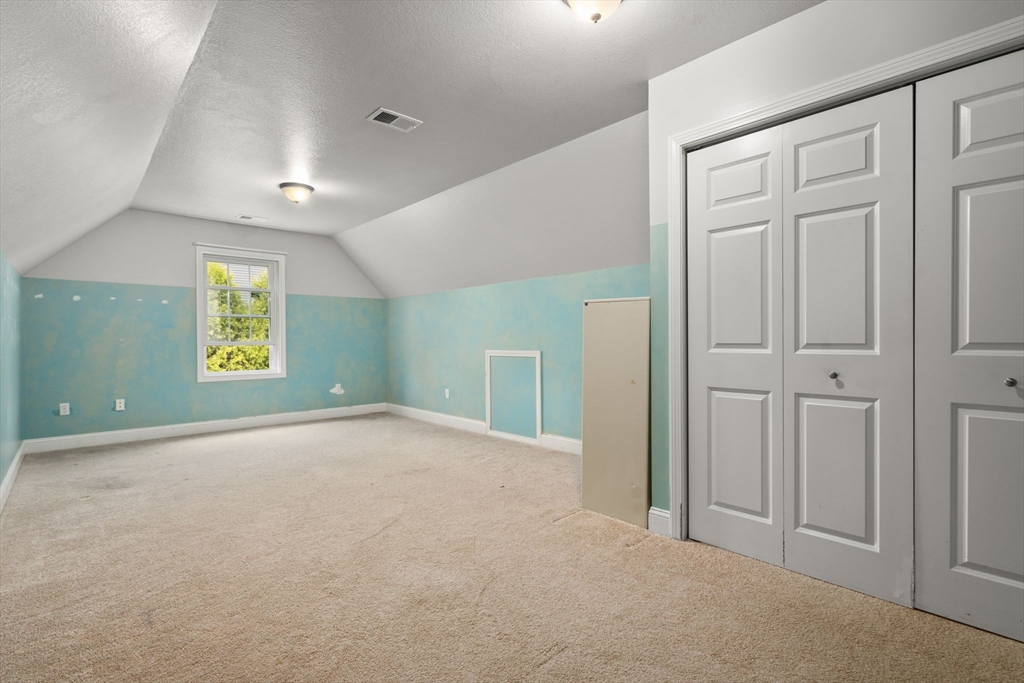 161 Bear Hole Road West Springfield, MA 01089 - Photo 30 of 35 an empty room with windows and closet
