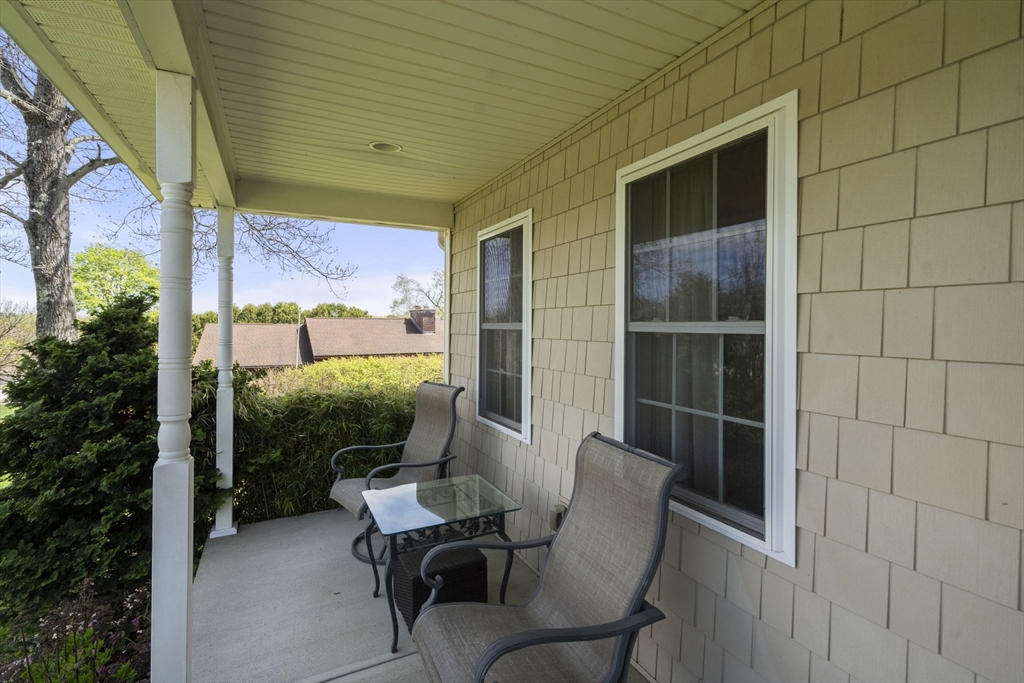 161 Bear Hole Road West Springfield, MA 01089 - Photo 5 of 35 a view of a porch with furniture and next to a yard