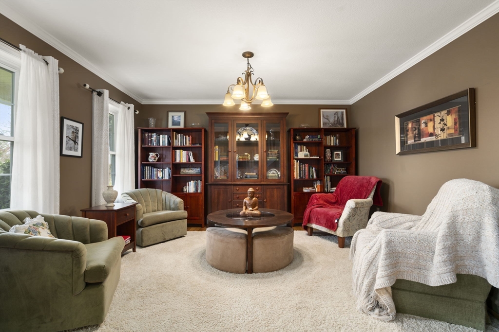 161 Bear Hole Road West Springfield, MA 01089 - Photo 7 of 35 a living room with furniture a chandelier and a window
