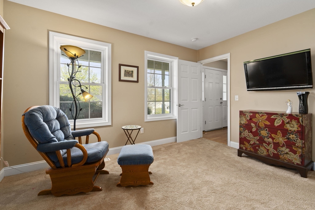 161 Bear Hole Road West Springfield, MA 01089 - Photo 9 of 35 a living room with furniture and a flat screen tv