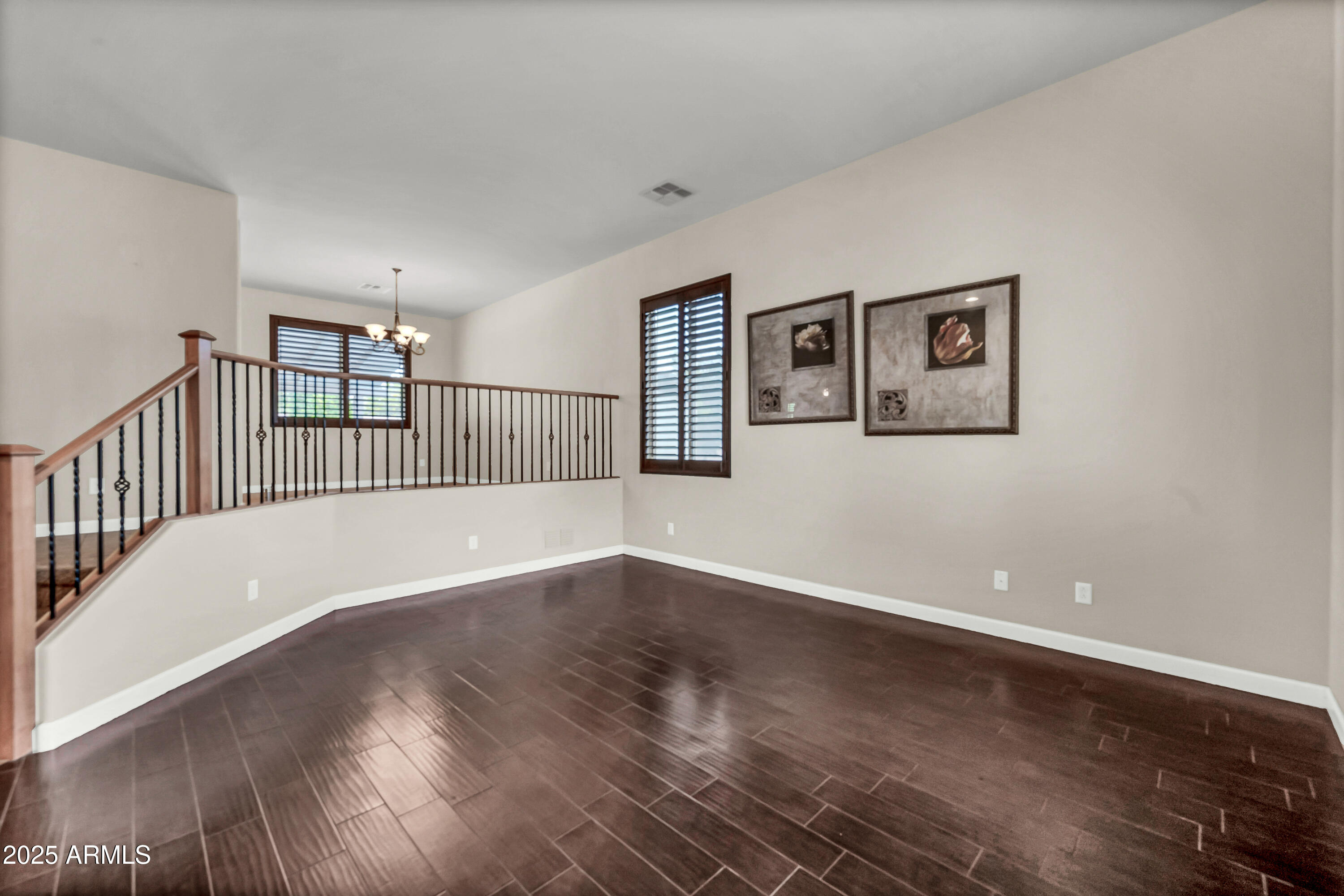 4587 South Ellesmere Street Gilbert, AZ 85297 - Photo 10 of 55 a view of a room with wooden floor
