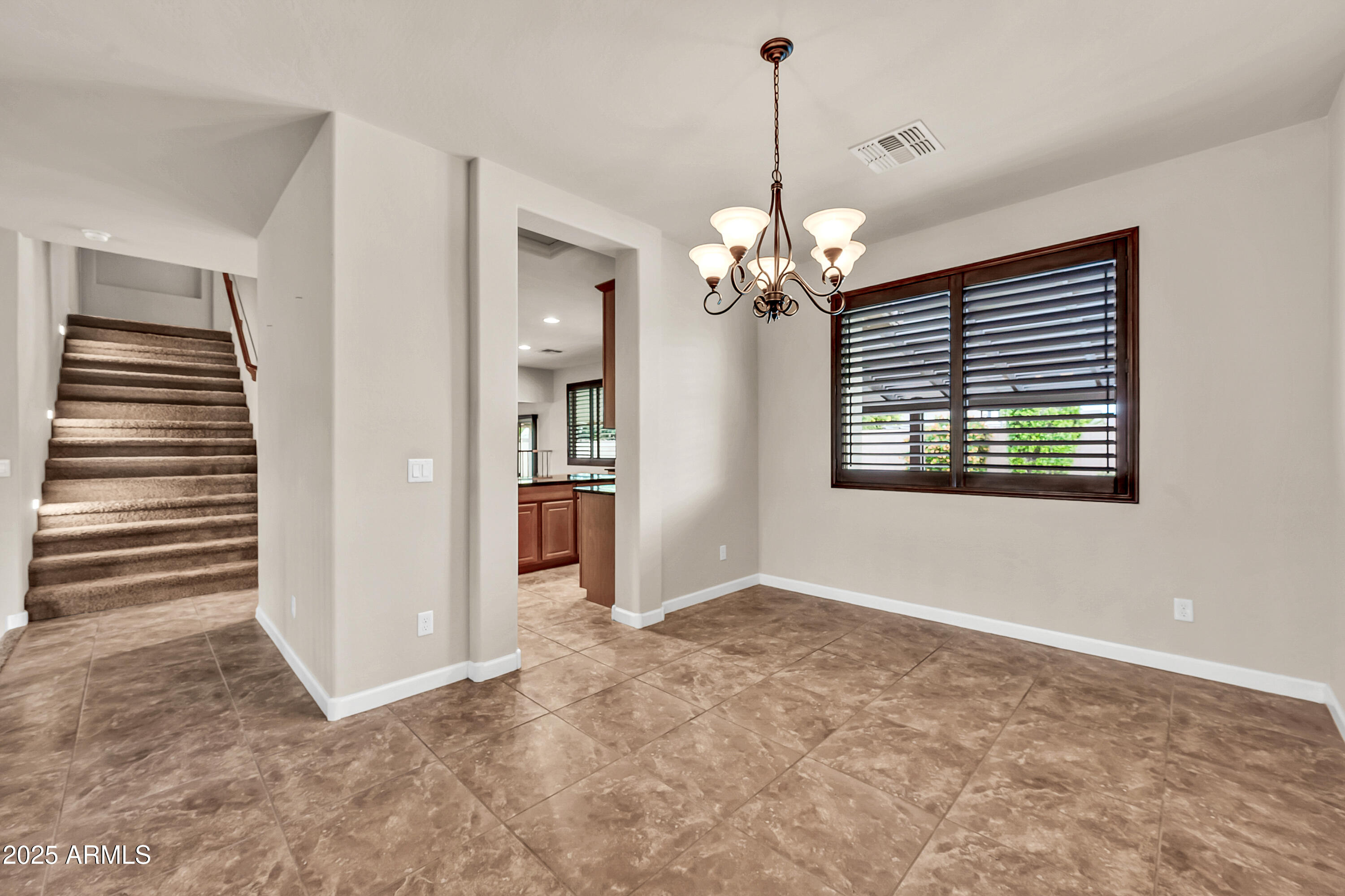 4587 South Ellesmere Street Gilbert, AZ 85297 - Photo 11 of 55 a view of an empty room with a window