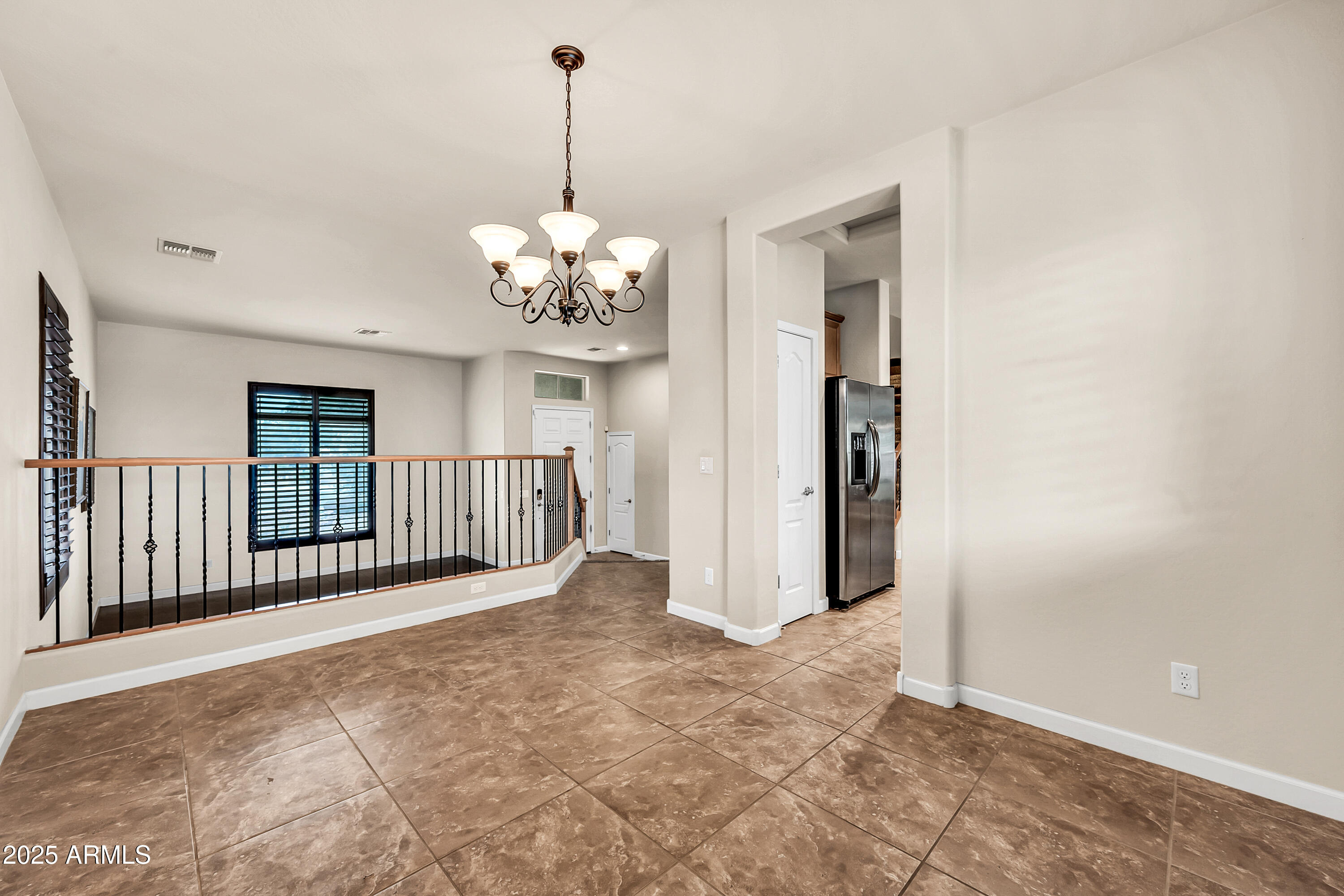 4587 South Ellesmere Street Gilbert, AZ 85297 - Photo 12 of 55 a view of a hallway with windows