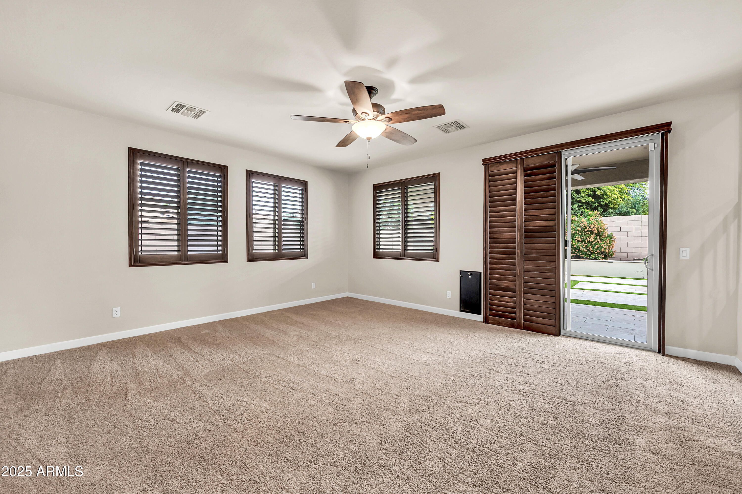 4587 South Ellesmere Street Gilbert, AZ 85297 - Photo 19 of 55 a view of an empty room with a window