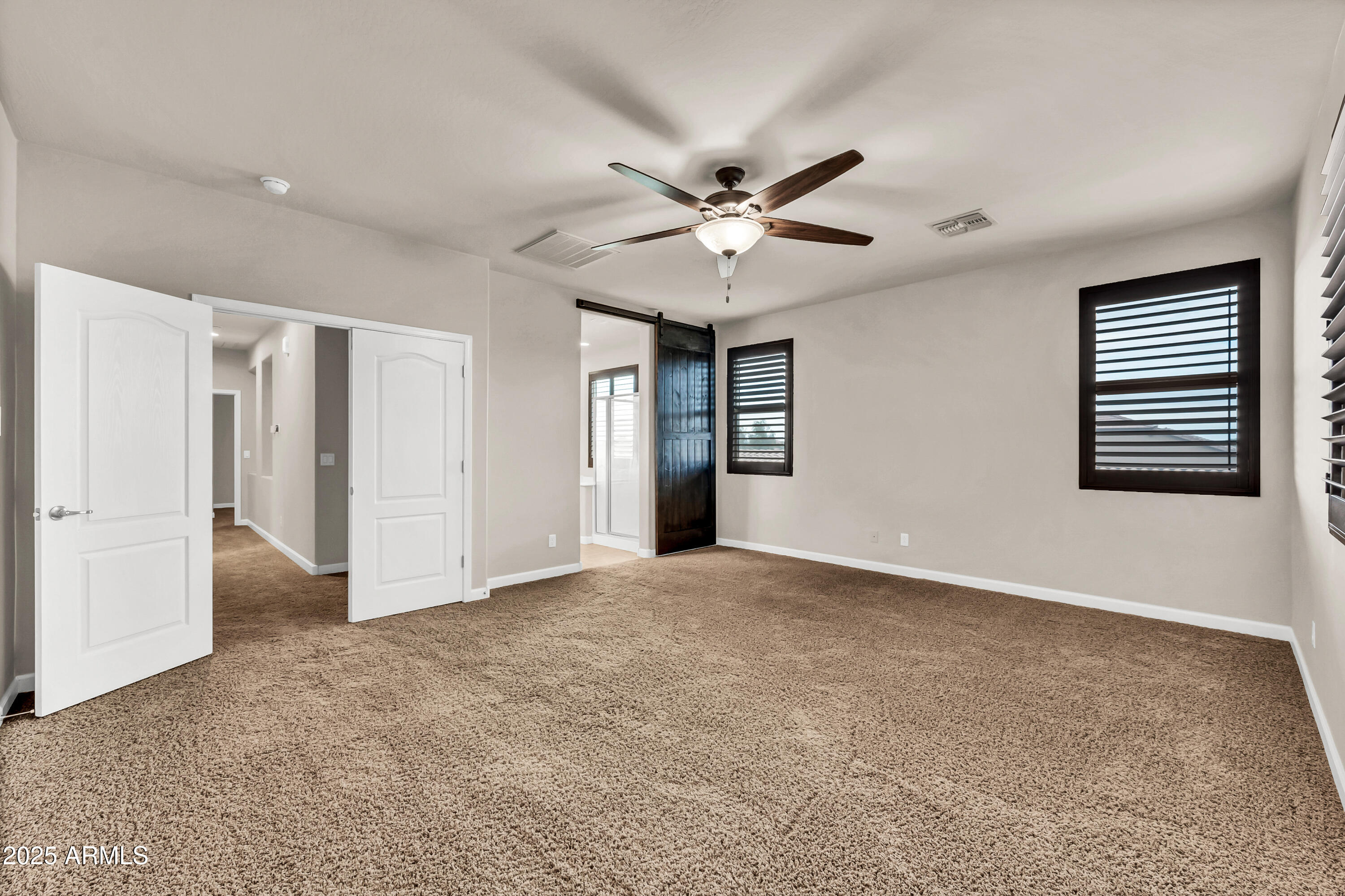 4587 South Ellesmere Street Gilbert, AZ 85297 - Photo 21 of 55 a view of an empty room with a window