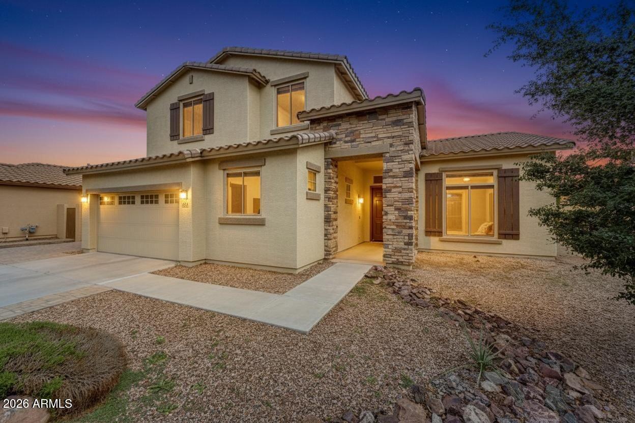 4587 South Ellesmere Street Gilbert, AZ 85297 - Photo 2 of 55 a view of a house with a yard