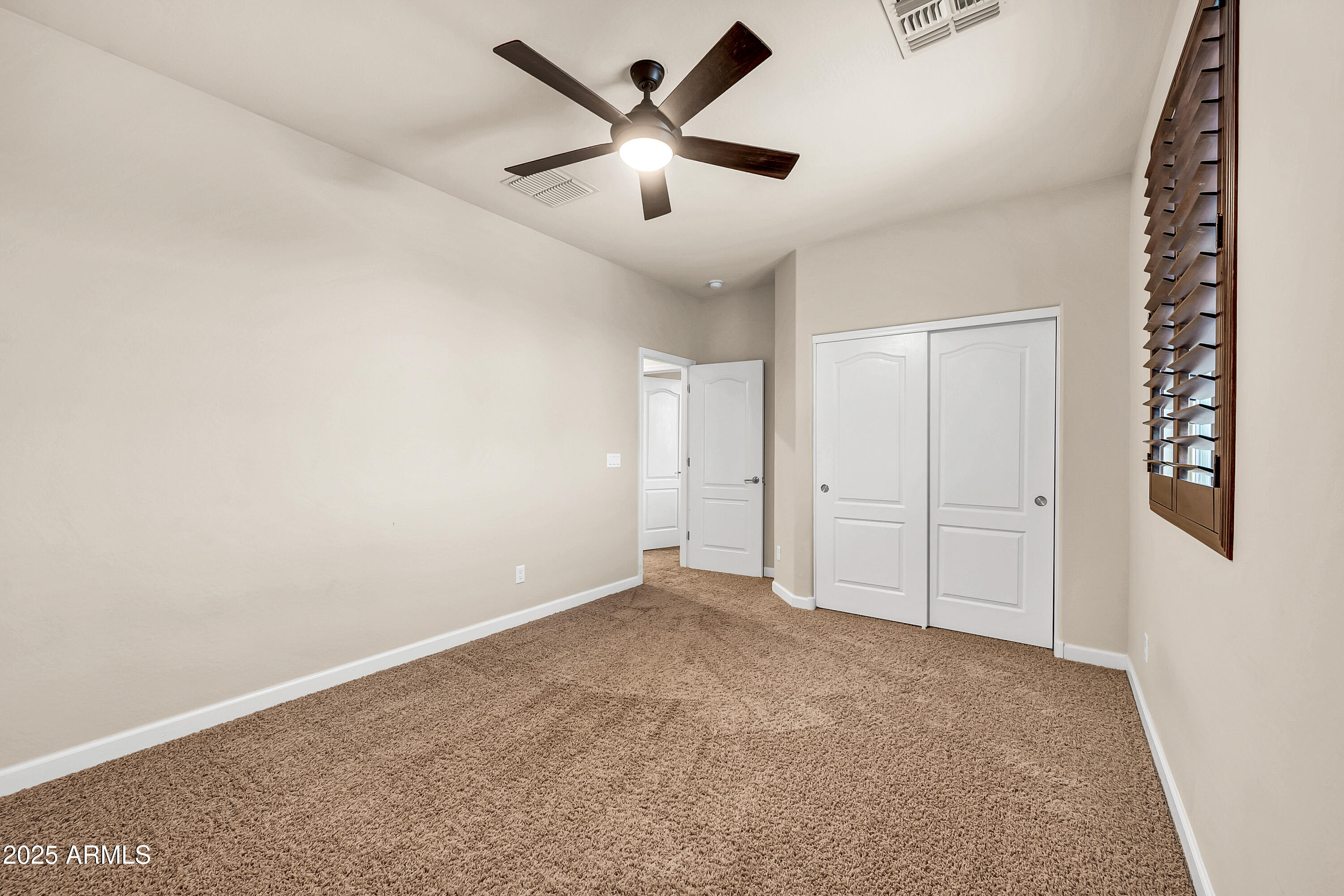 4587 South Ellesmere Street Gilbert, AZ 85297 - Photo 29 of 55 wooden floor in an empty room
