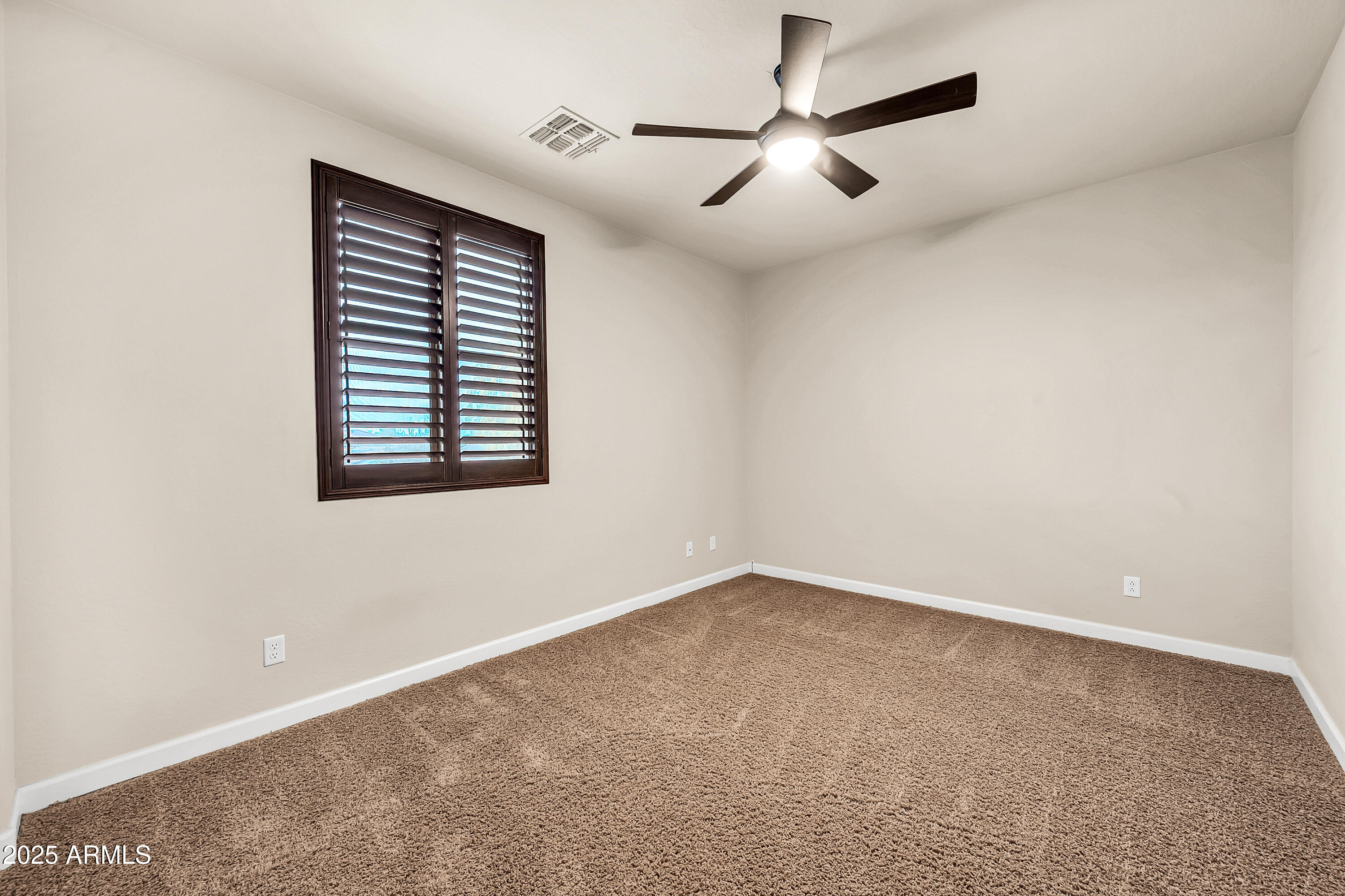 4587 South Ellesmere Street Gilbert, AZ 85297 - Photo 30 of 55 a view of an empty room with a window
