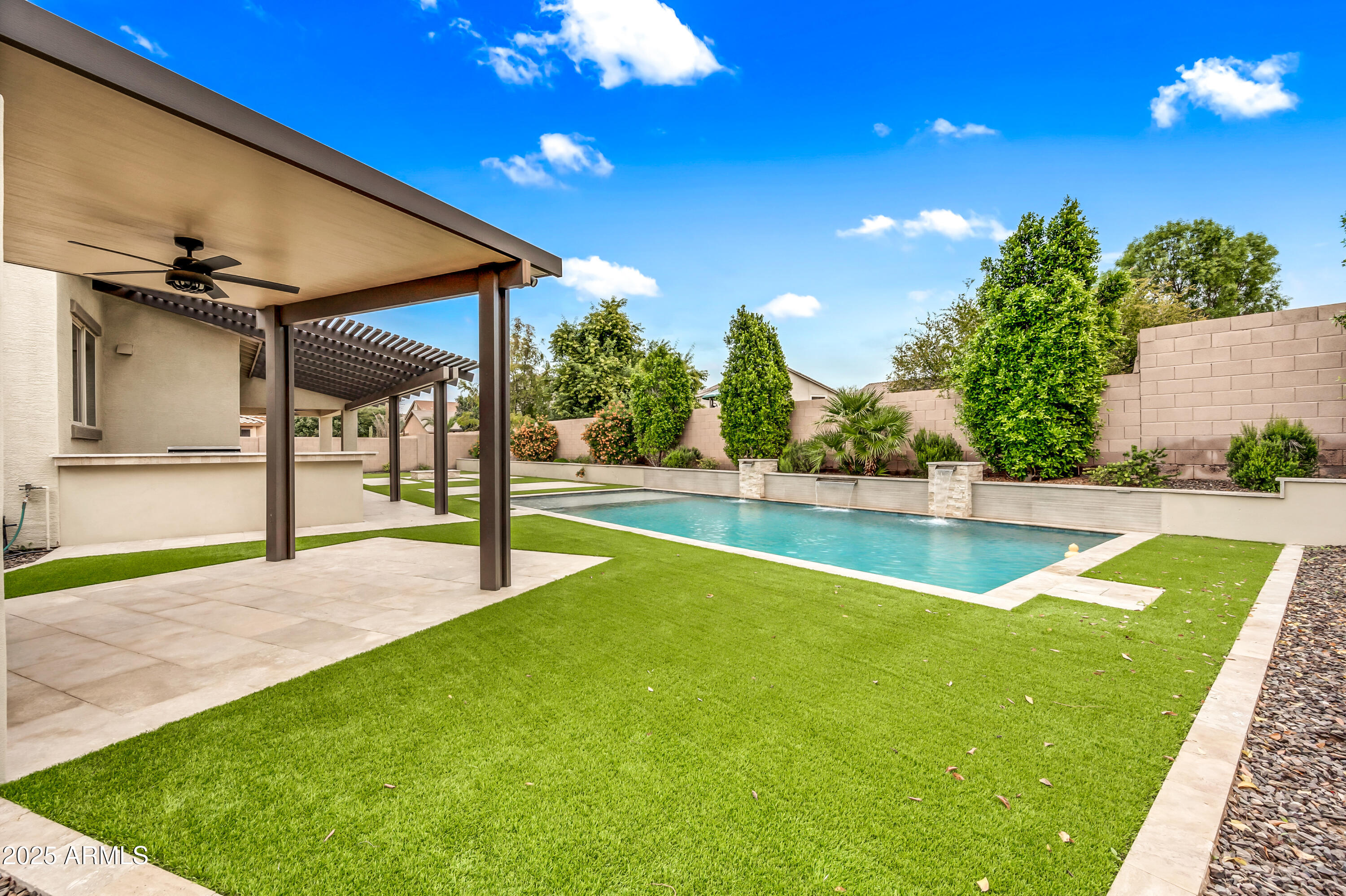 4587 South Ellesmere Street Gilbert, AZ 85297 - Photo 37 of 55 a view of a backyard of a house