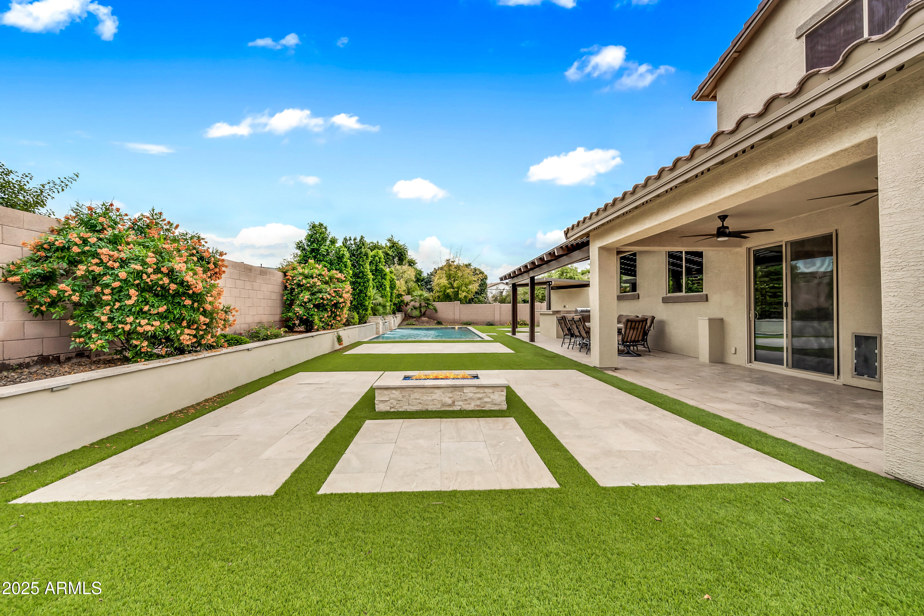 4587 South Ellesmere Street Gilbert, AZ 85297 - Photo 43 of 55 a view of swimming pool with outdoor seating and yard