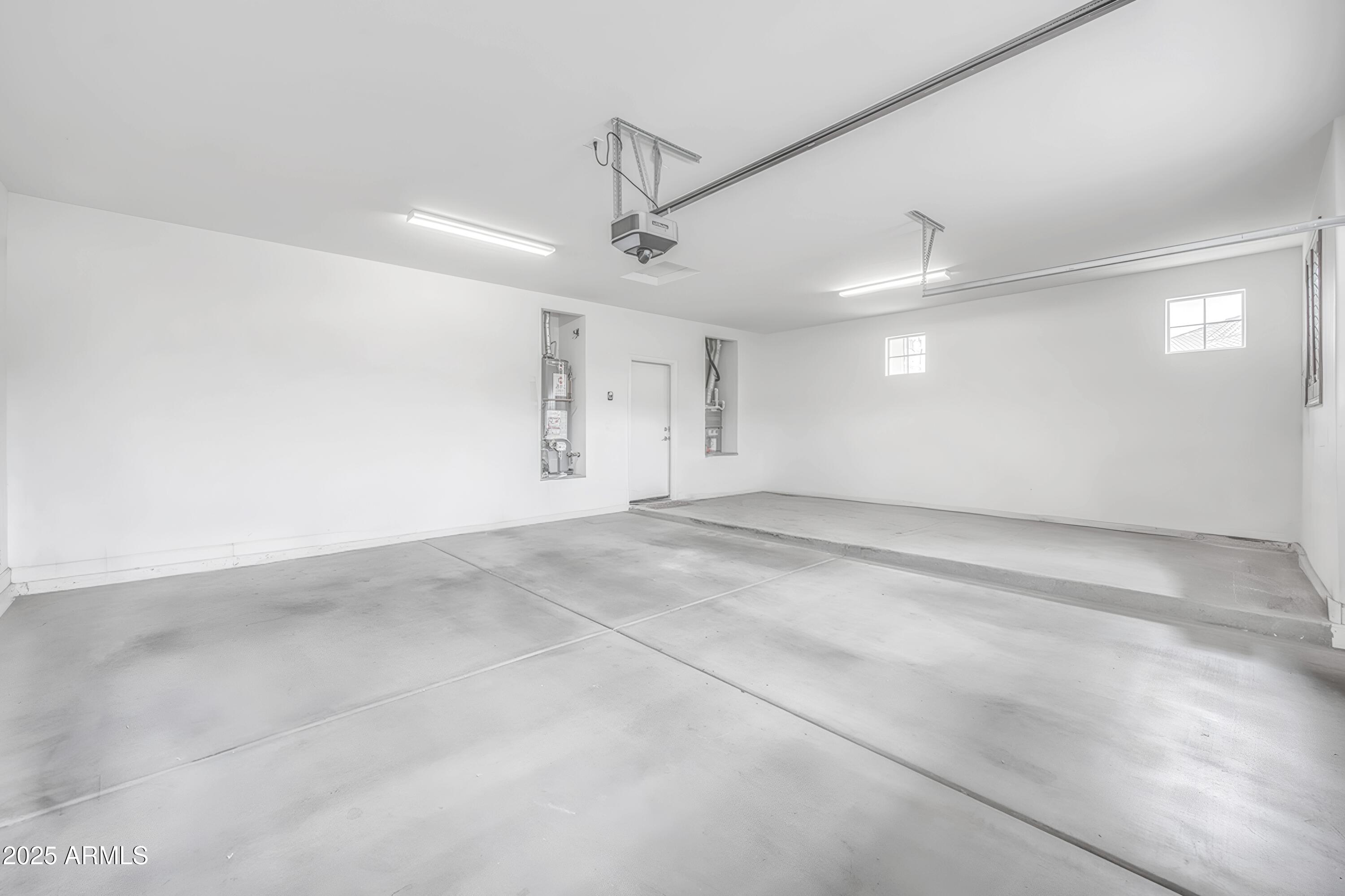 4587 South Ellesmere Street Gilbert, AZ 85297 - Photo 47 of 55 an empty room with windows and fan