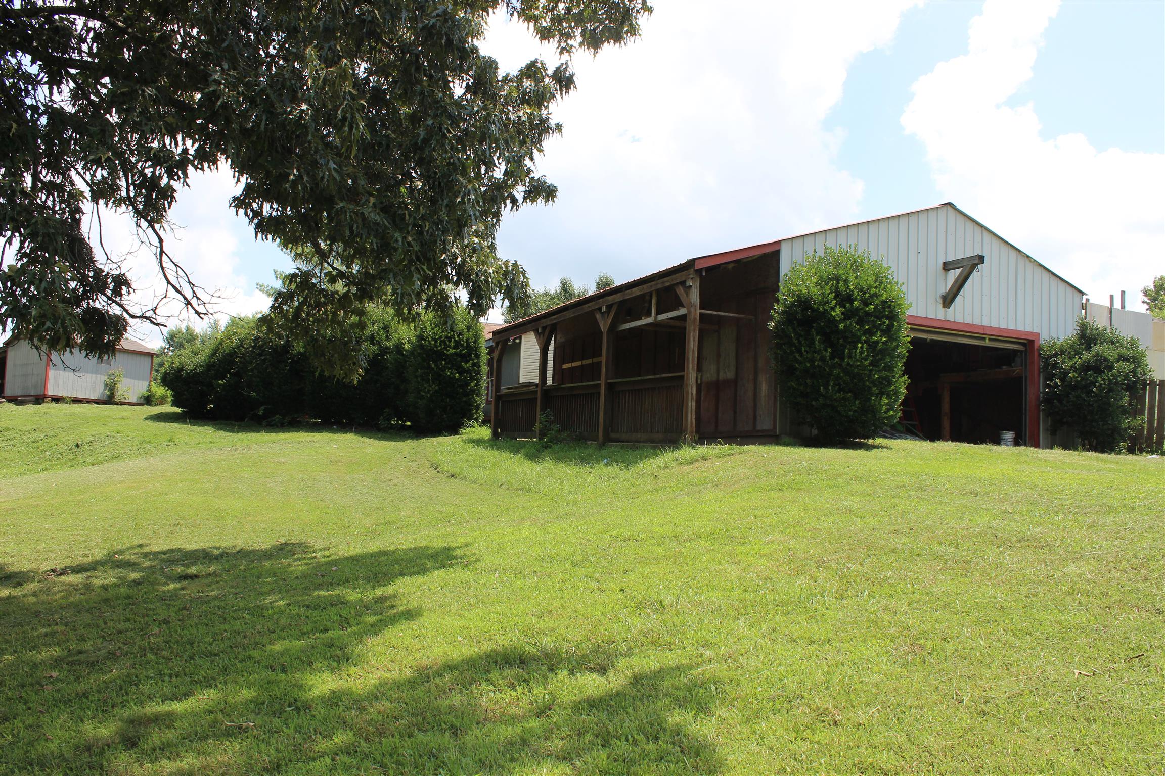 4029 Woodard Road Springfield, TN 37172 - Photo 15 of 16 a front view of house with a garden