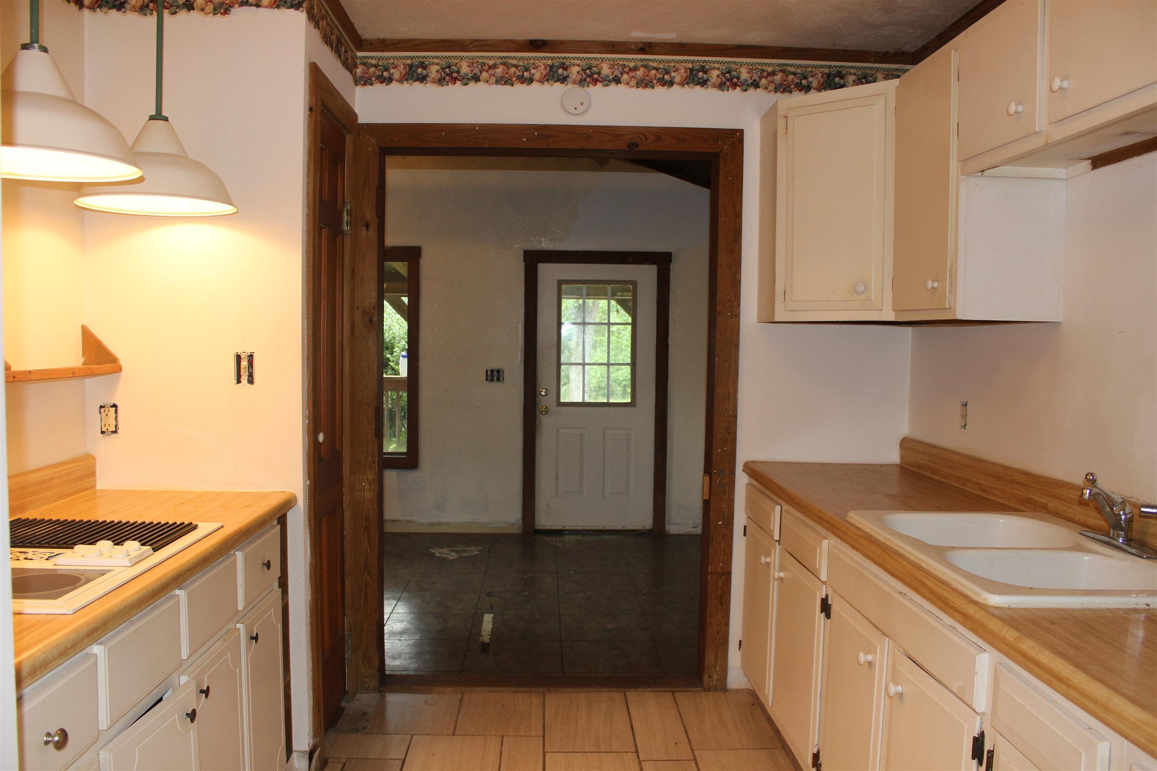 4029 Woodard Road Springfield, TN 37172 - Photo 4 of 16 a bathroom with a sink and a mirror