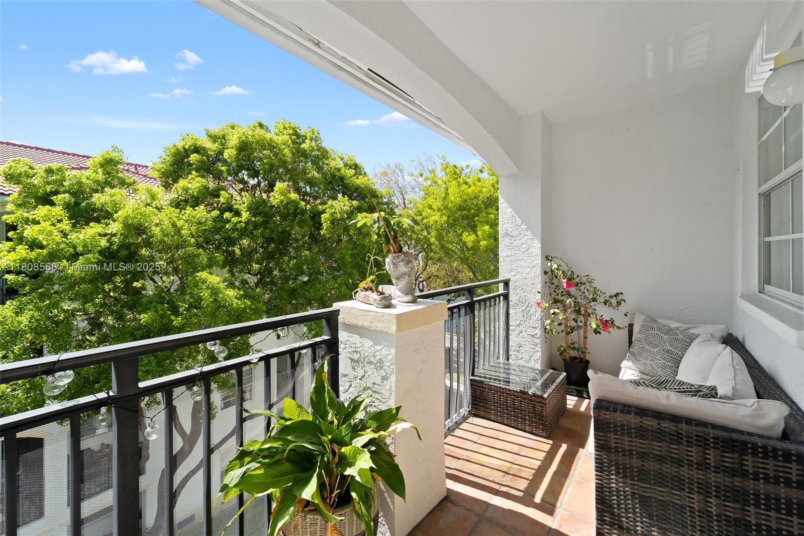 3245 Northeast 184th Street, Unit 13402 Aventura, FL 33160 - Photo 11 of 28 a view of a balcony with chairs