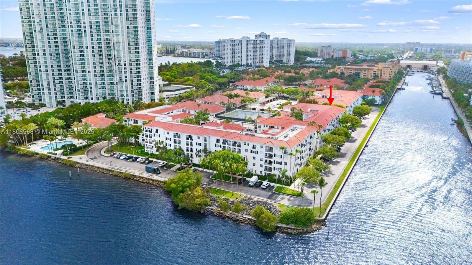 3245 Northeast 184th Street, Unit 13402 Aventura, FL 33160 - Photo 27 of 28 a view of a garden with an outdoor space