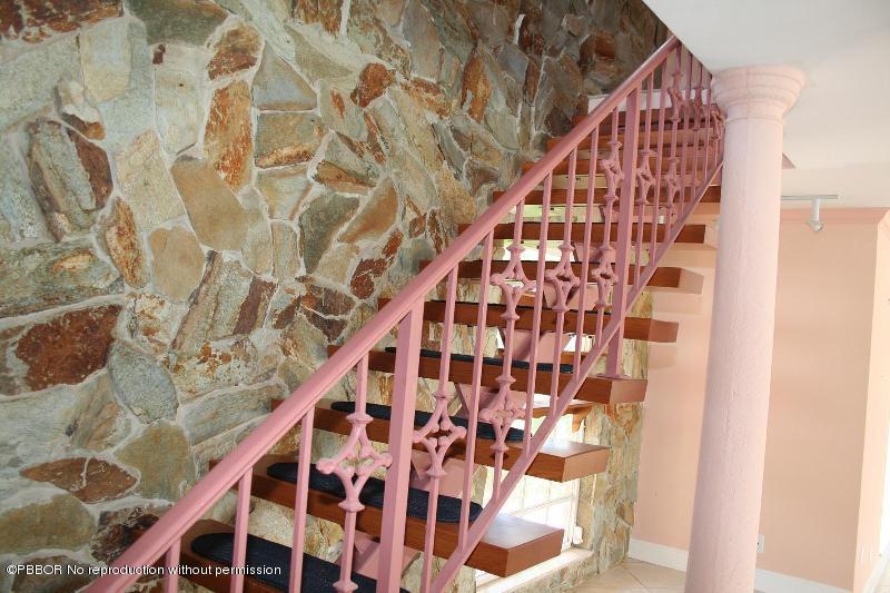 1515 Lands End Road Manalapan, FL 33462 - Photo 11 of 21 a view of staircase with wooden floor