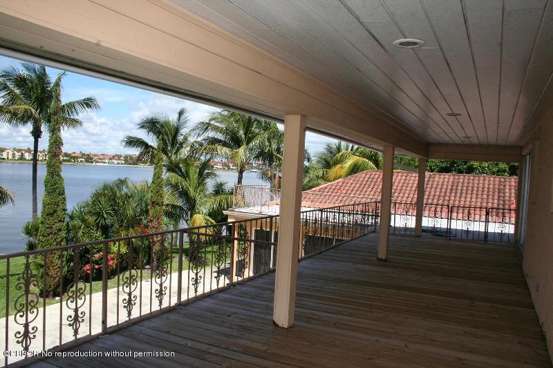 1515 Lands End Road Manalapan, FL 33462 - Photo 14 of 21 a view of a porch