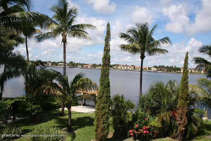 1515 Lands End Road Manalapan, FL 33462 - Photo 16 of 21 a large body of water with palm trees