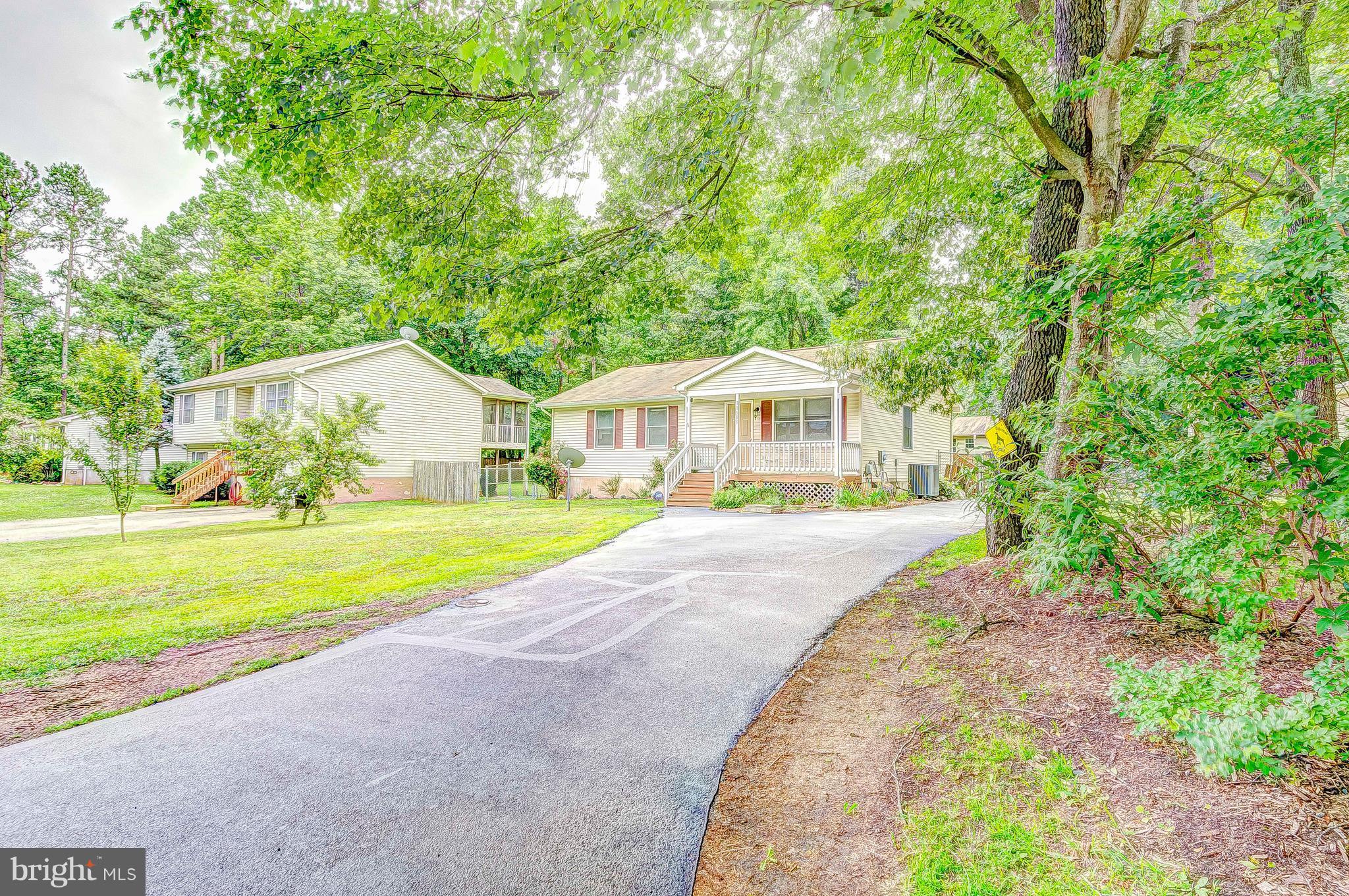 11589 Ropeknot Road Lusby, MD 20657 - Photo 2 of 30 Paved driveway.