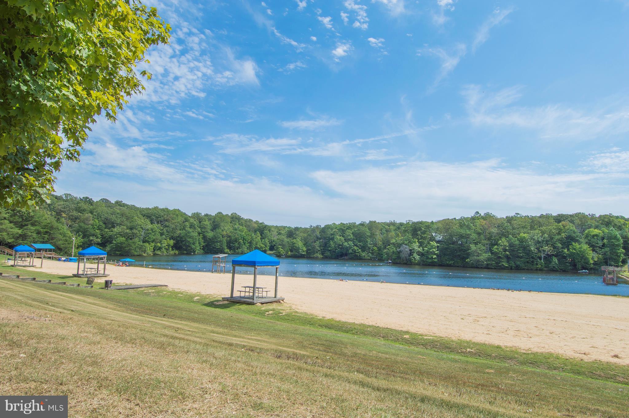 11589 Ropeknot Road Lusby, MD 20657 - Photo 27 of 30 huge sandy beach on the lake