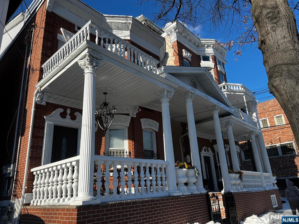 3 Montclair Avenue, Unit 2 Paterson, NJ 07503 - Photo 1 of 24 a view of a house with a window