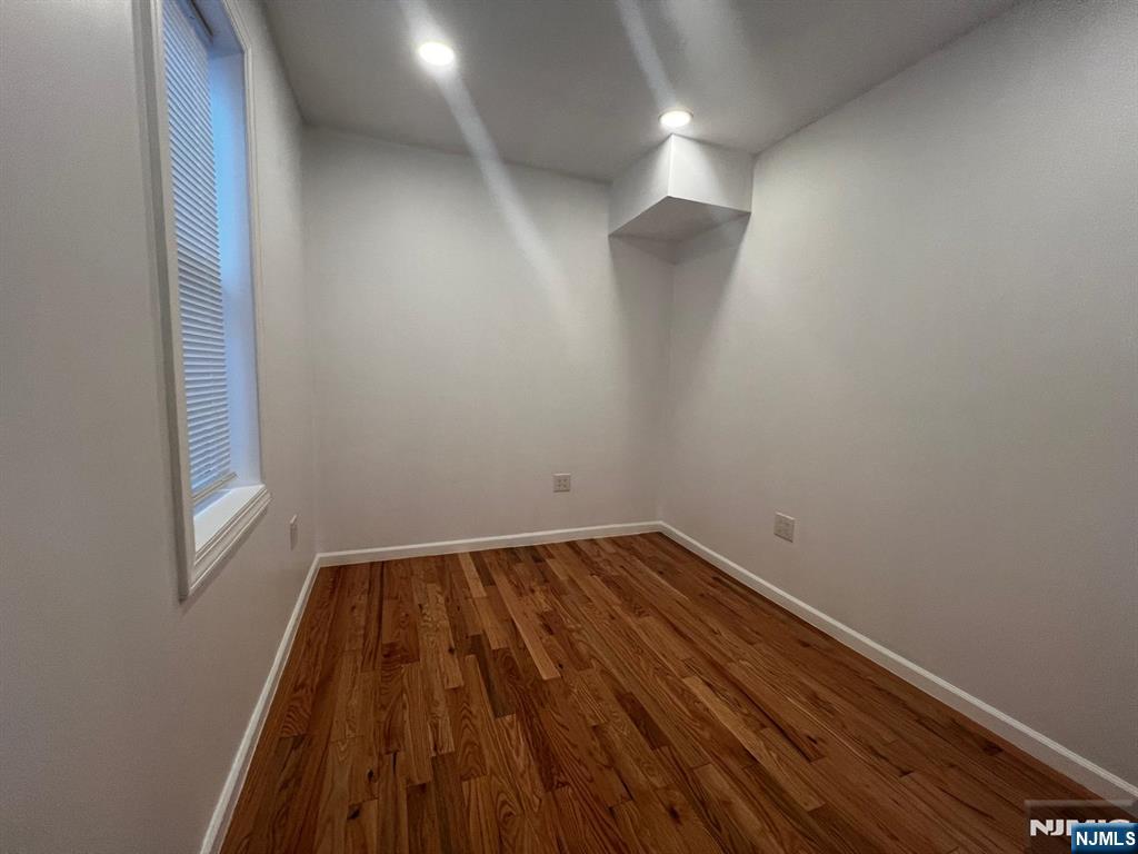 3 Montclair Avenue, Unit 2 Paterson, NJ 07503 - Photo 15 of 24 a view of wooden floor in a room