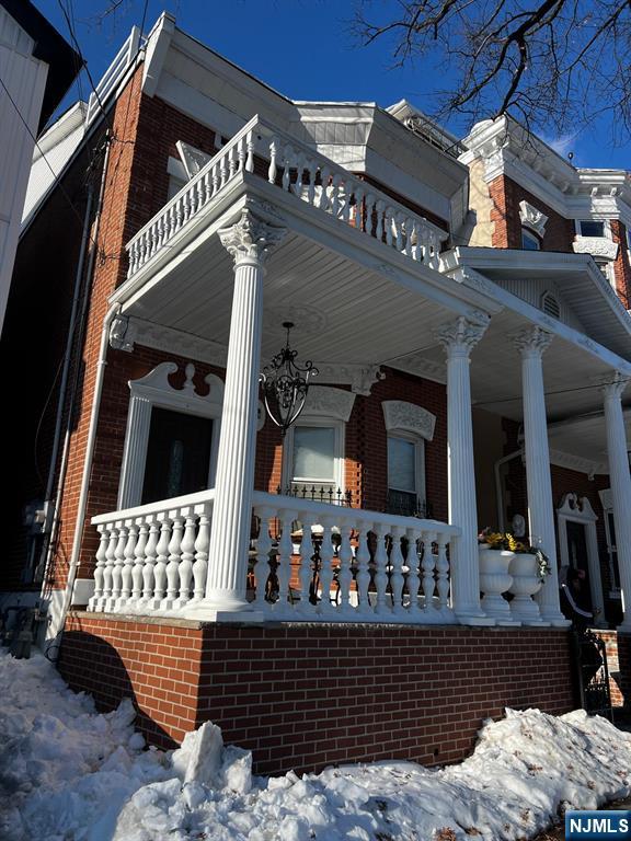 3 Montclair Avenue, Unit 2 Paterson, NJ 07503 - Photo 3 of 24 a view of a house with a wooden deck
